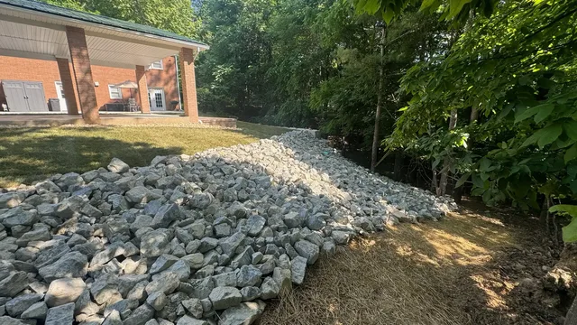 Riprap erosion control on residential slope